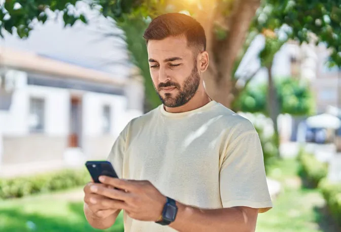 Homeowner using the MyJABLOTRON app